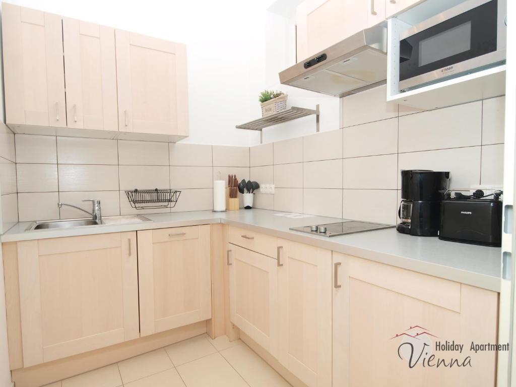 Apartment Enenkelstrasse Вена Номер фото